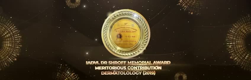 Gold medallion salver engraved for the IADVL Dr. Shroff Memorial Award for meritorious contribution to dermatology.